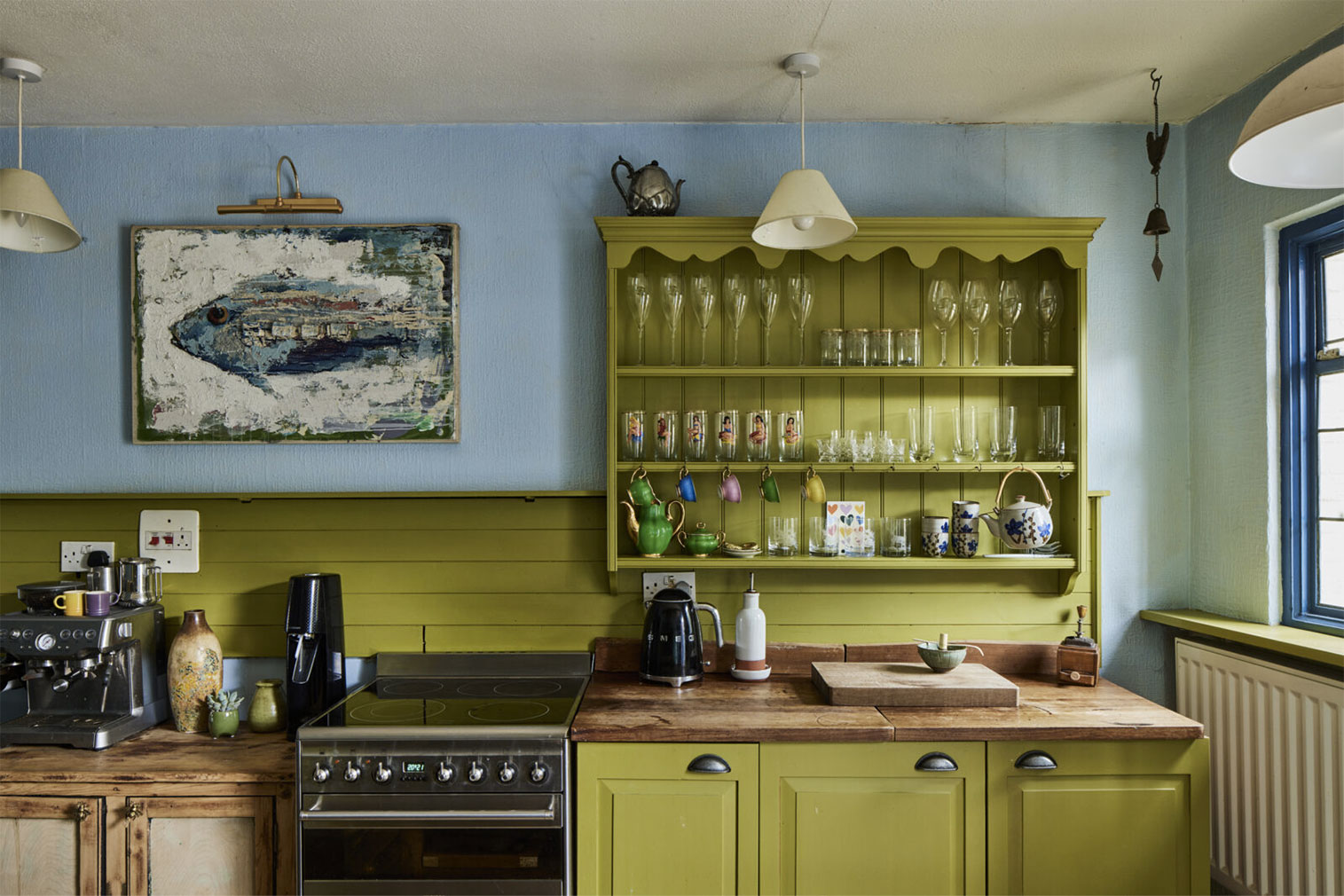 The kitchen features bespoke cabinetry