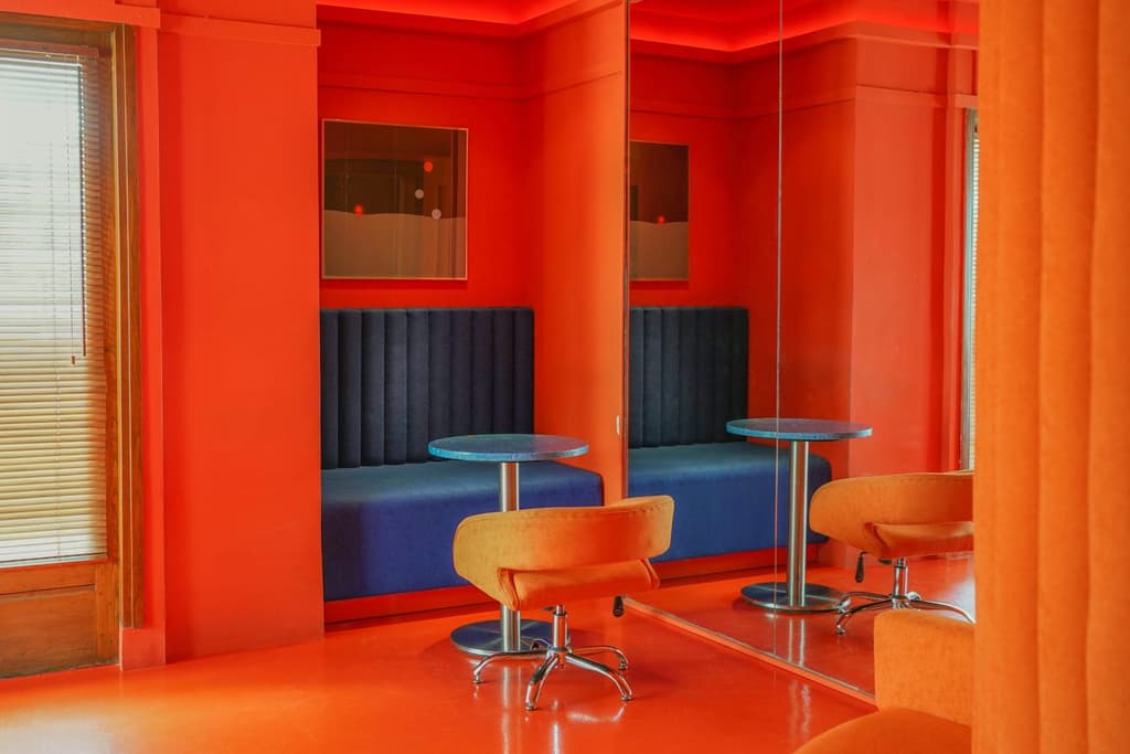 Banquette seating offers a place to pore over purchases and sip a cocktail at Peels Records' sound bar