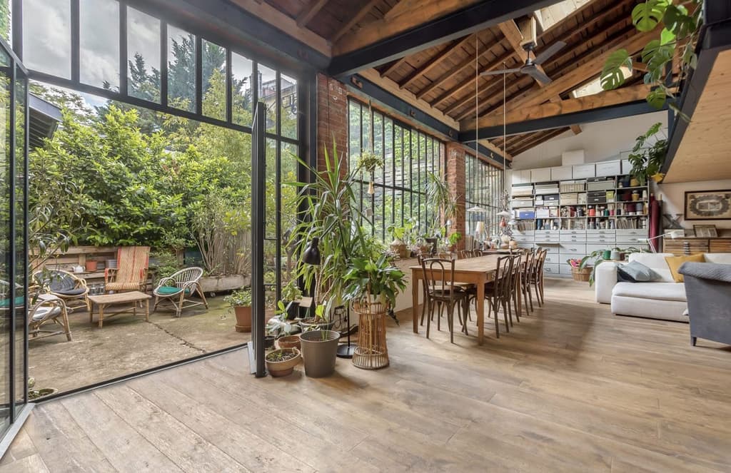 Former mechanic’s garage is reborn as a rugged industrial home in Lyon