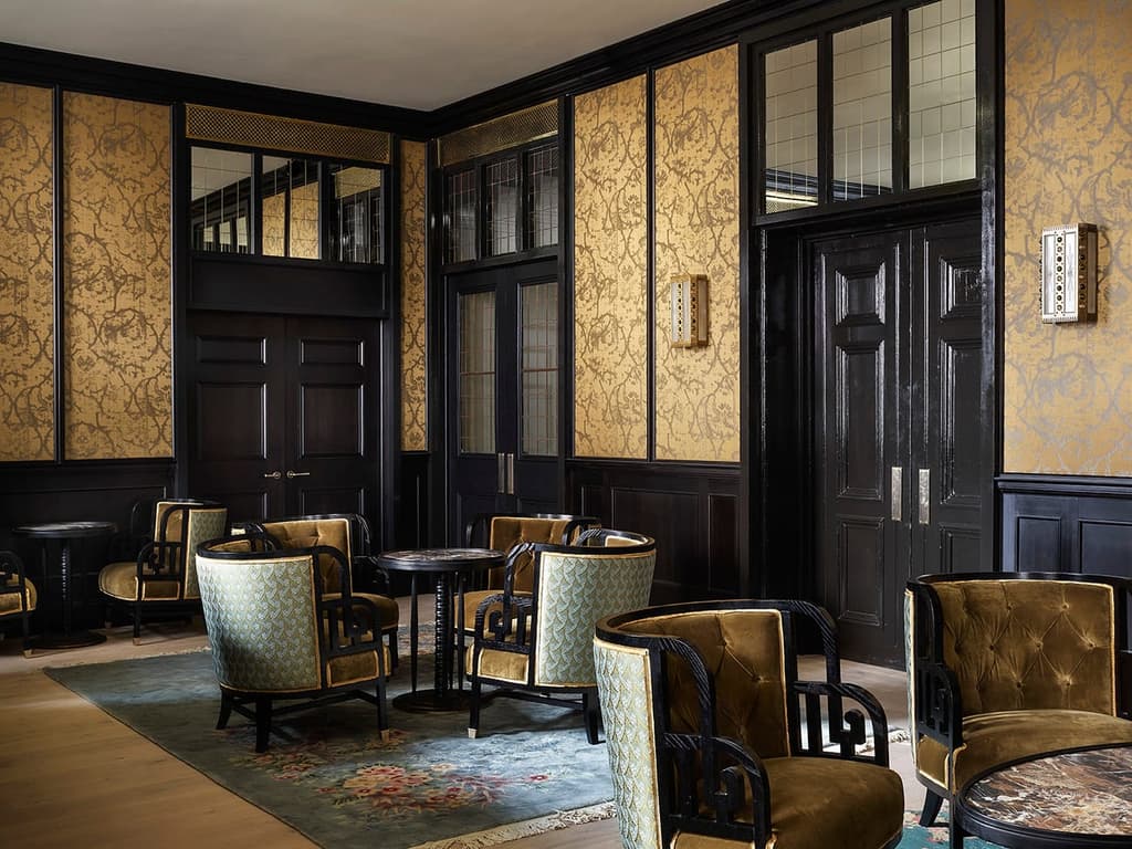 Wallpaper is used heavily across Roman and William's interiors, which pick up cues from the Covent Garden location and its floral offerings