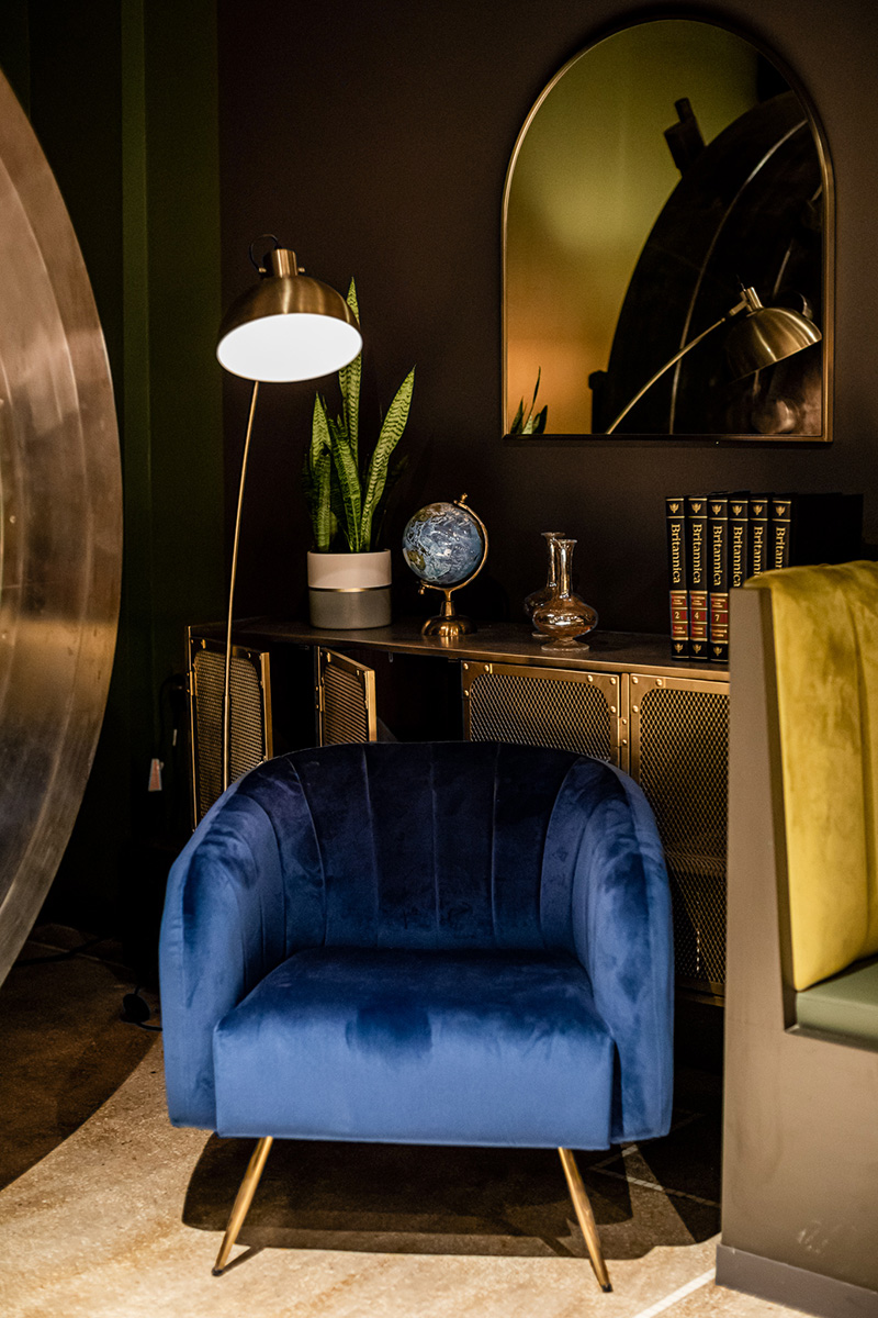Velvet is a soft contrast to the harder interior elements of the space