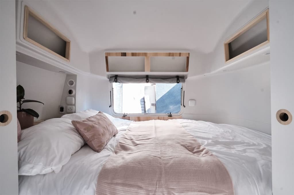 The bedroom has a full-size double bed