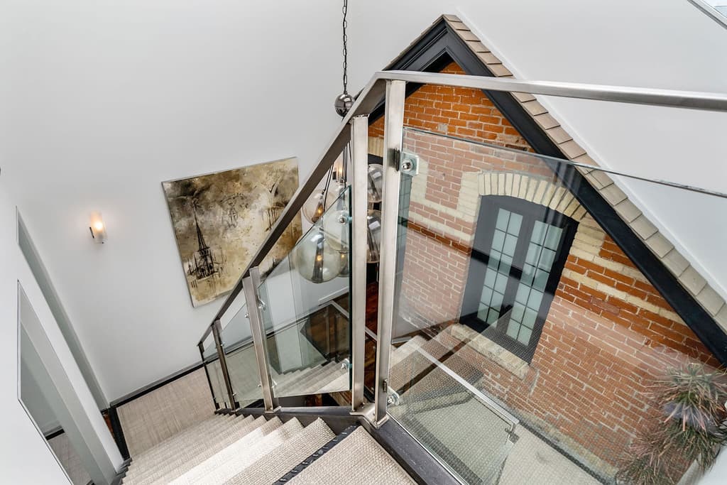The building's brick facade is visible inside the house