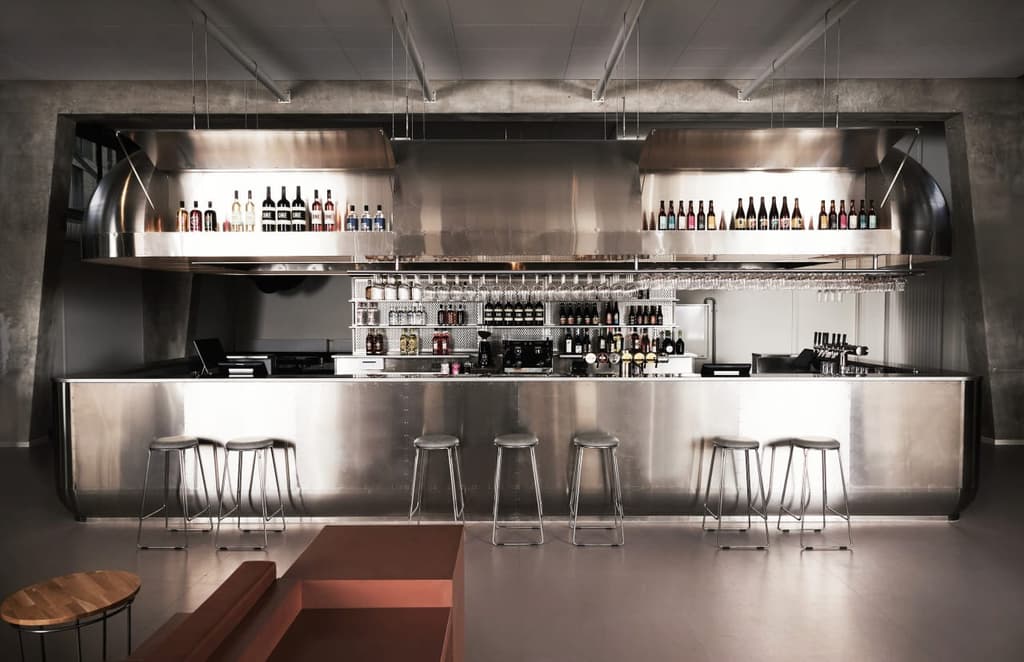 Stainless steel rules at the communal bar which adds a sophisticated industrial flare to the hostel