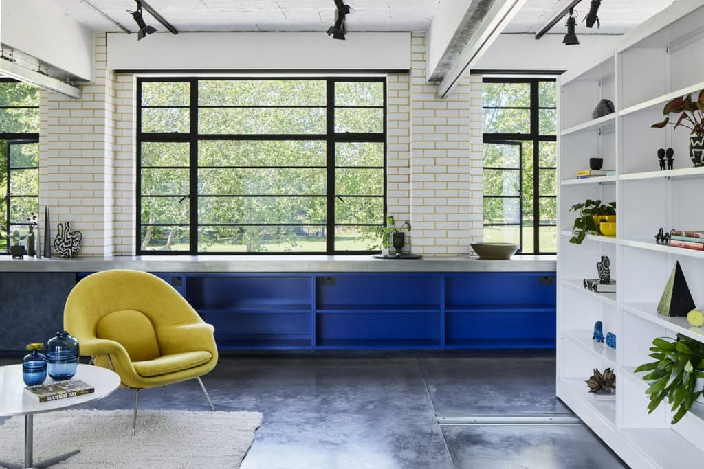 Bookshelves and pivoting library shelves help to maximise storage and create cosy corners