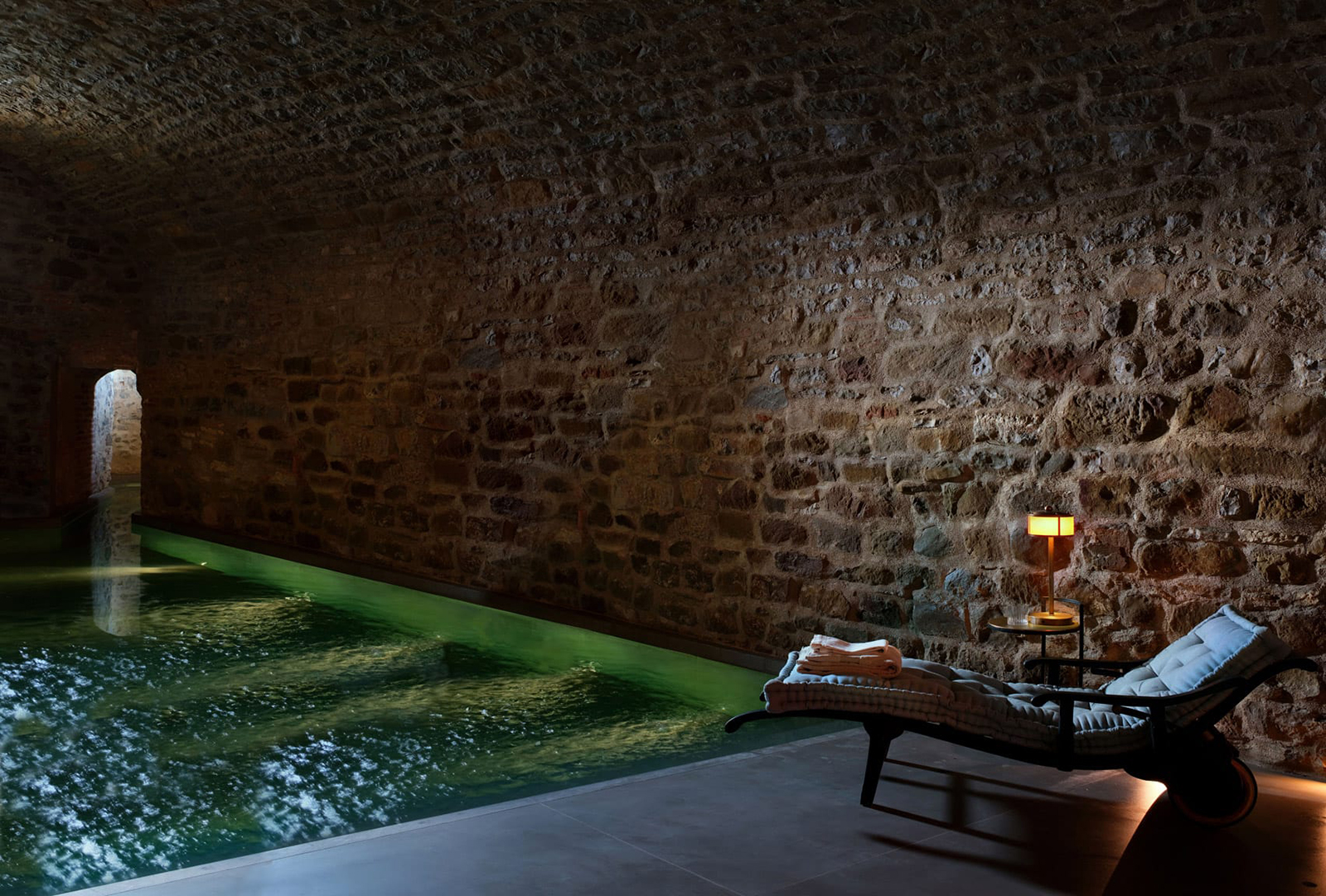 As well as an outdoor pool, set into the hotel lawn, the castle’s ancient wine cellars are now a Roman bath-inspired spa