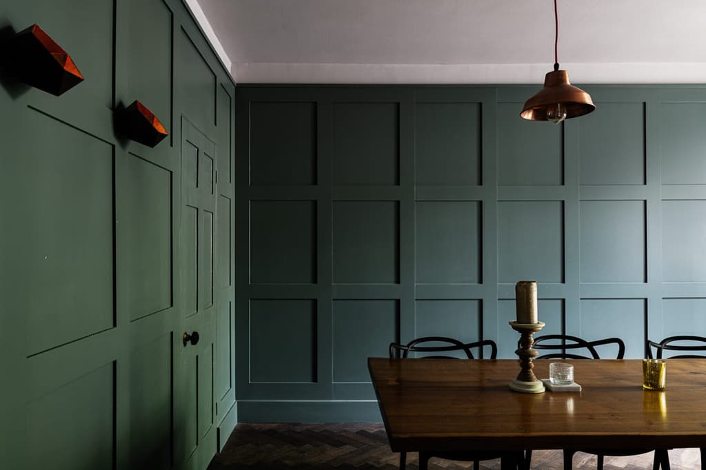 Teal panelling in the dining room