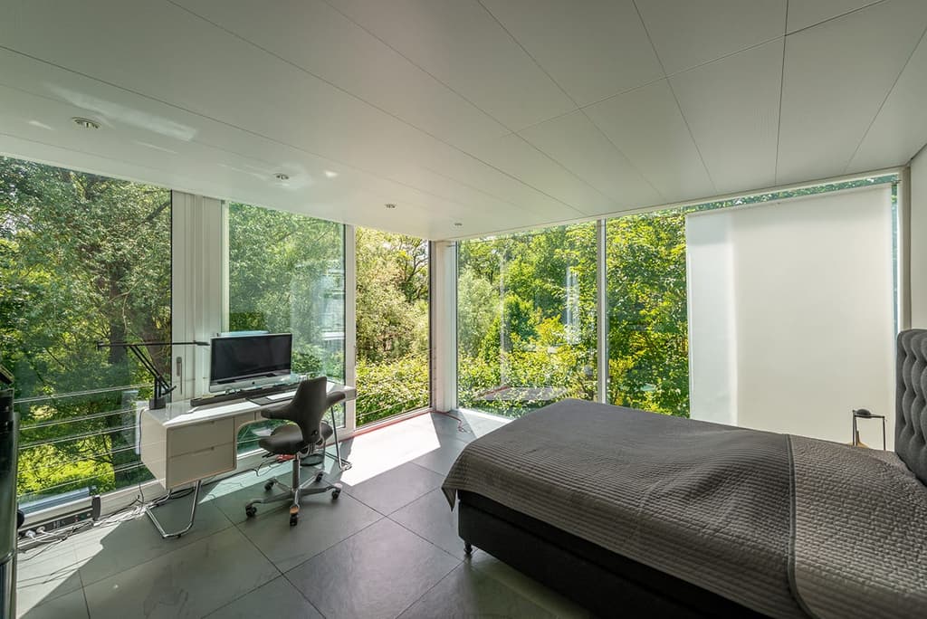 Almost every room has views across the tree canopy and mature gardens