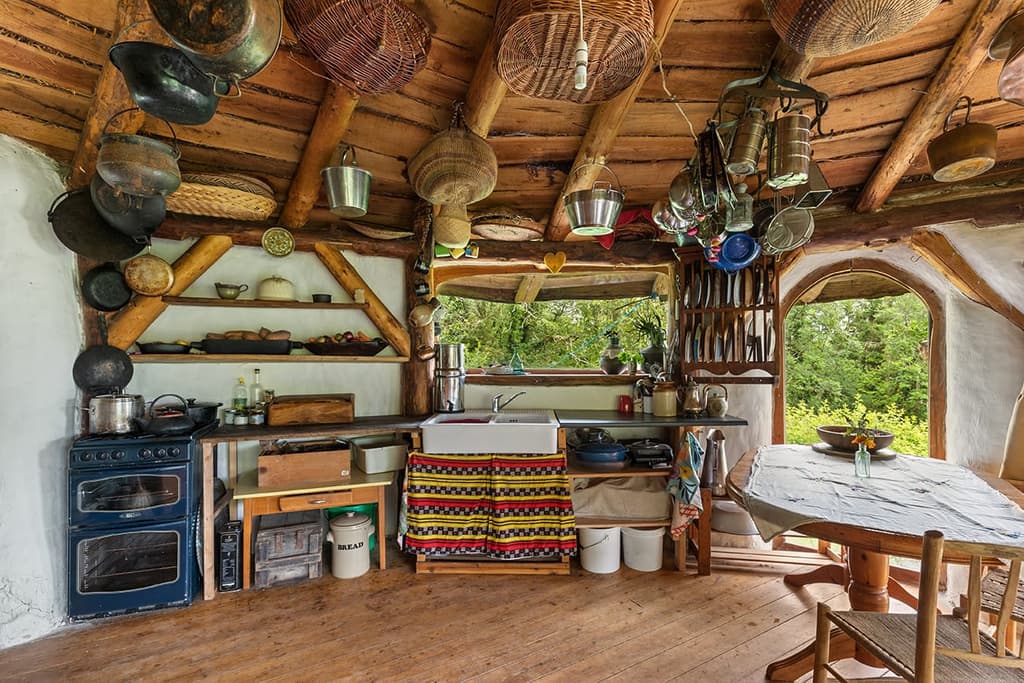 The idyllic Welsh property is built with timber and earth and features the necessities for off-grid living