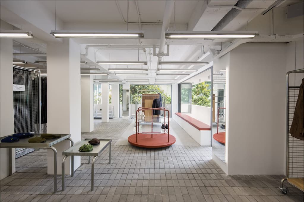 A metal carousel in the middle of the store deliberately recalls the kind found in children's playgrounds across the globe