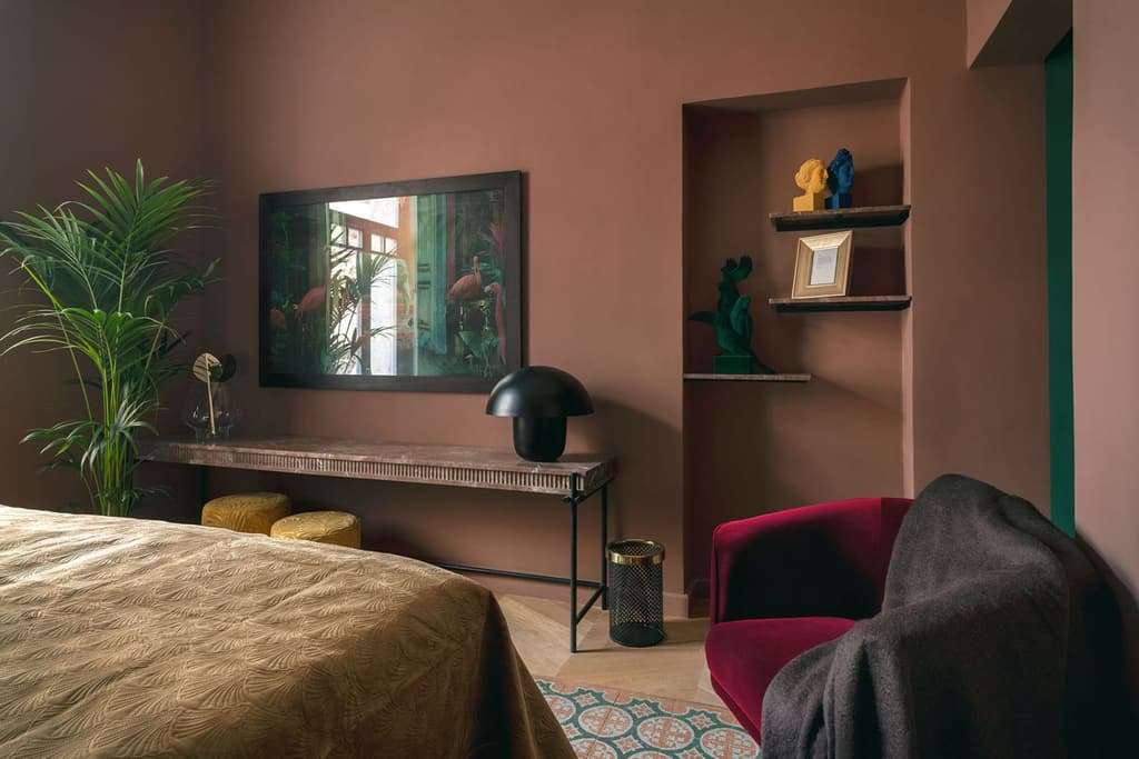A colourful pink bedroom suite at the Aristide Hotel, Syros