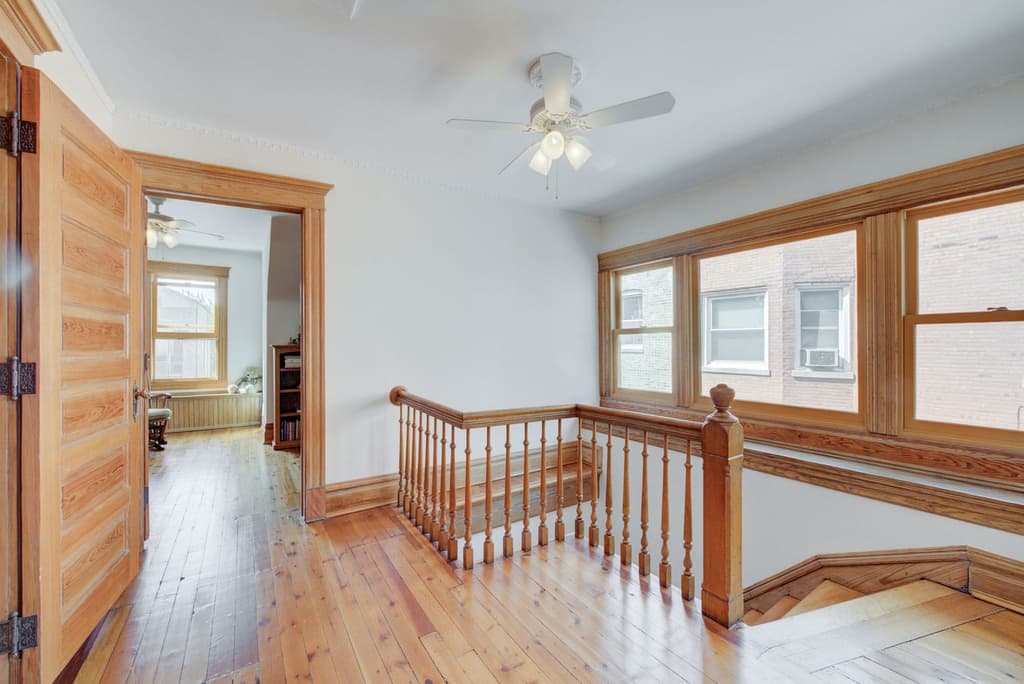 The hand-turned staircase connects four storeys of the property