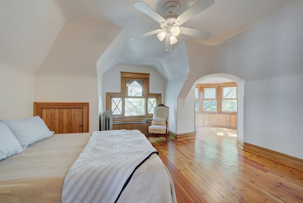 One of six bedrooms inside the property. Windows and woodwork are all original.