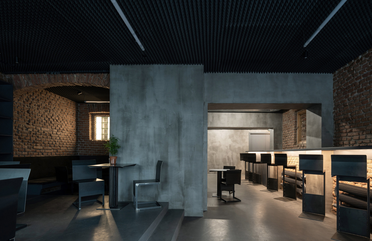 Prague’s Studio Krymská opens to reveal raw, brooding interiors