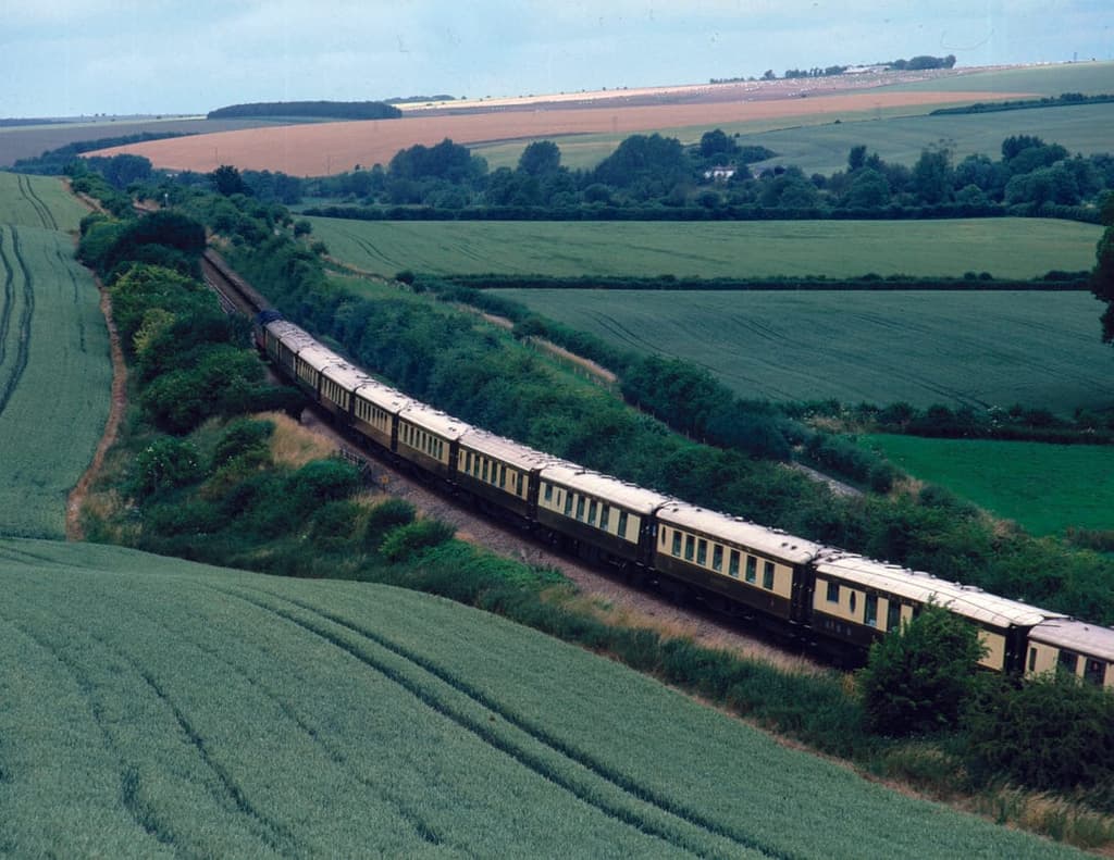 The British Pullman train is operated by Belmond and features nine carriages. The Wes Anderson carriage is the latest addition to the vehicle and features his signature design touches including rectilinear shapes, art deco flourishes and vivid colours