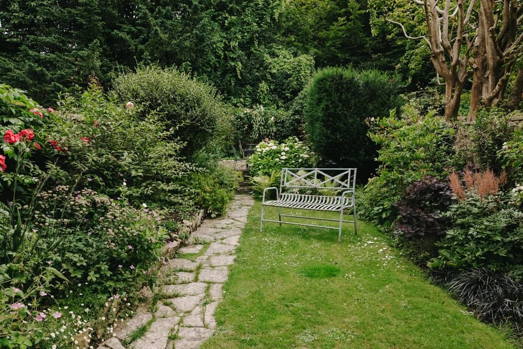 The property has a private walled garden at the rear as well as access to a landscaped communal garden in the front