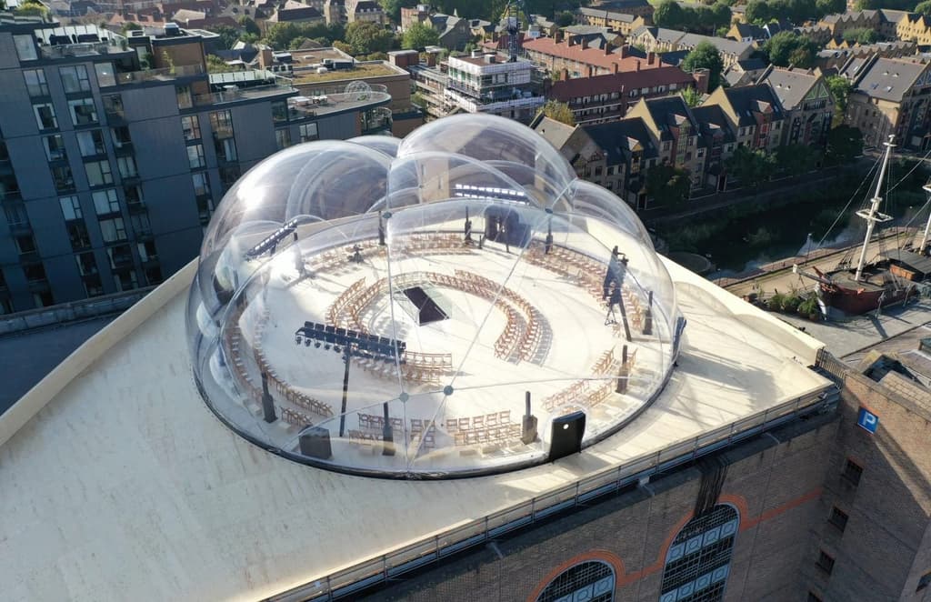 An inflatable soap bubble was home to the Alexander McQueen SS22 show, which took place atop a London car park.