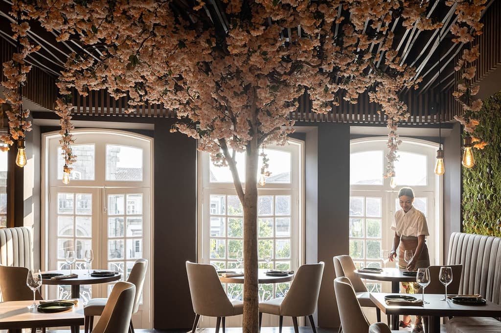 Flowers bloom inside restaurant 34 in the historic centre of Guimarães