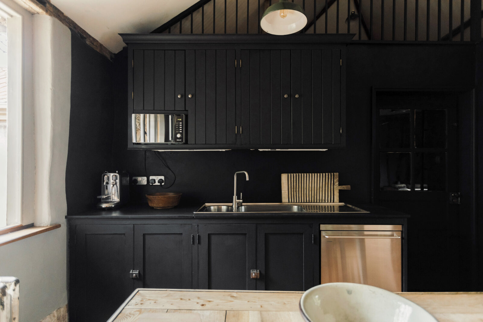 An 18th-century workshop is now a rustic home in east Sussex