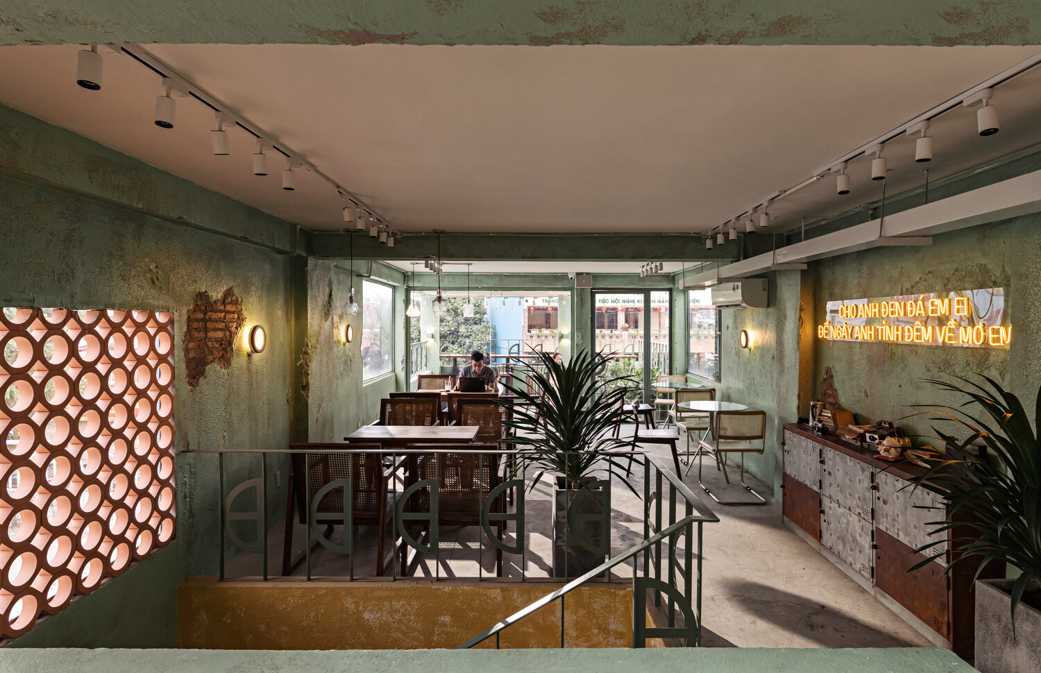 Worn and weathered interiors are served at this Ho Chi Minh City coffee shop