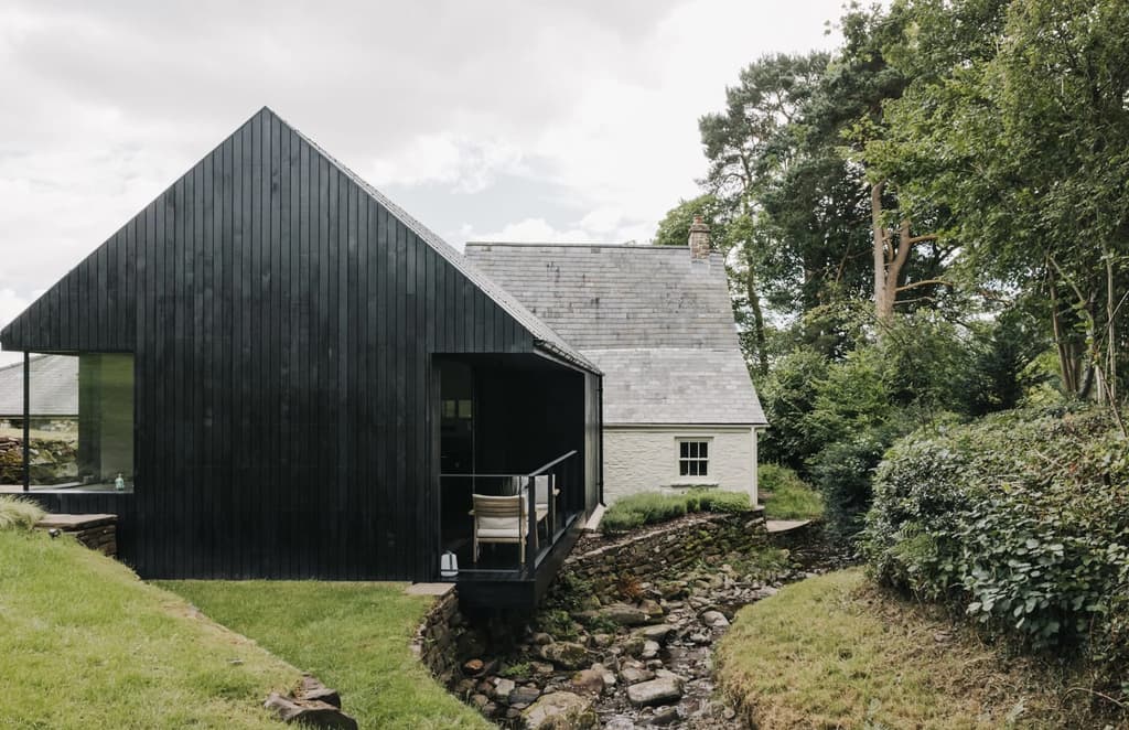 An architect-designed farmhouse conversion in rural Wales lists for under £1m