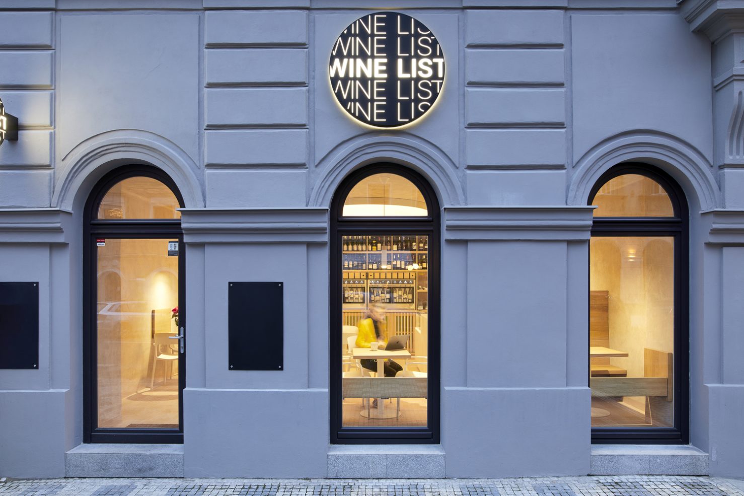 Prague bar Wine List celebrates its past via 'layered' interiors The