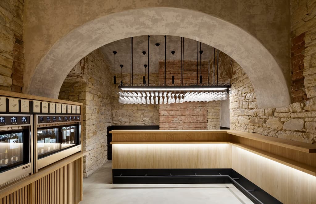 Prague bar Wine List celebrates its past via 'layered' interiors