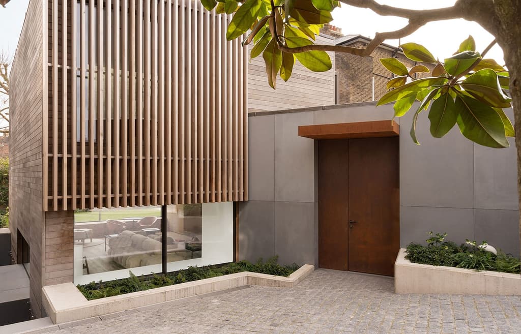 Corten steel and concrete enliven this contemporary London home