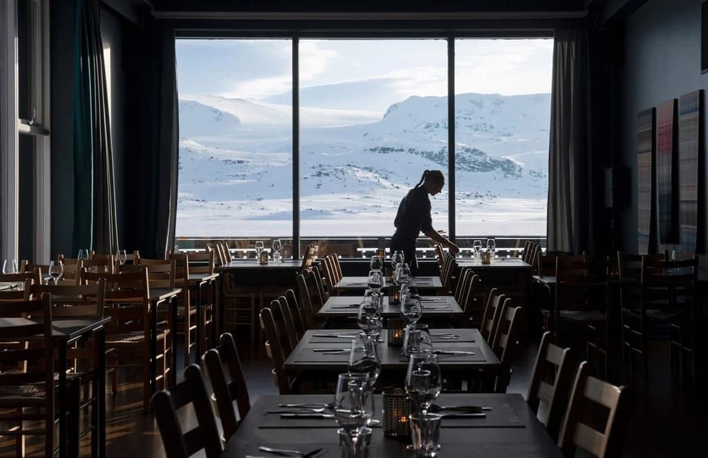 Snøhetta embraces blue and orange for its overhaul of Hotel Finse 1222