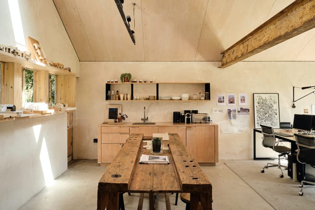 Exposed beams and weathered steel are contrasted by clean ply surfaces