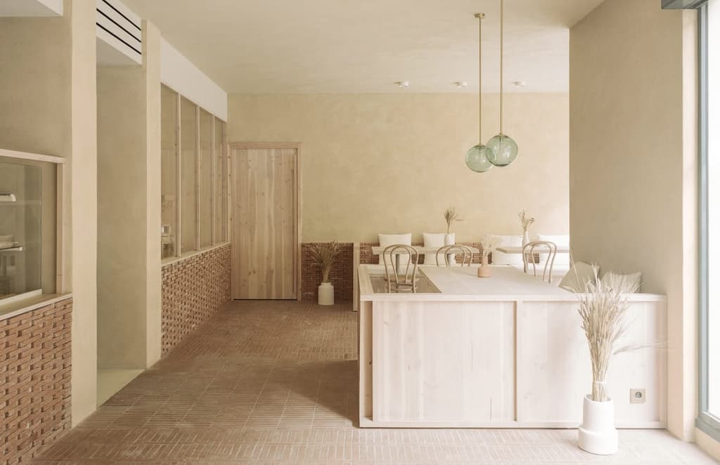 Plaster and terracotta pay homage to the craft of bread-making at this French bakery