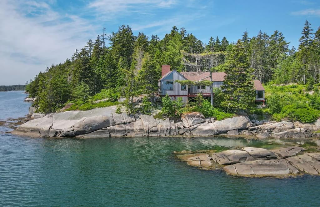 This all-season ocean-front home began life as a mid-century cabin