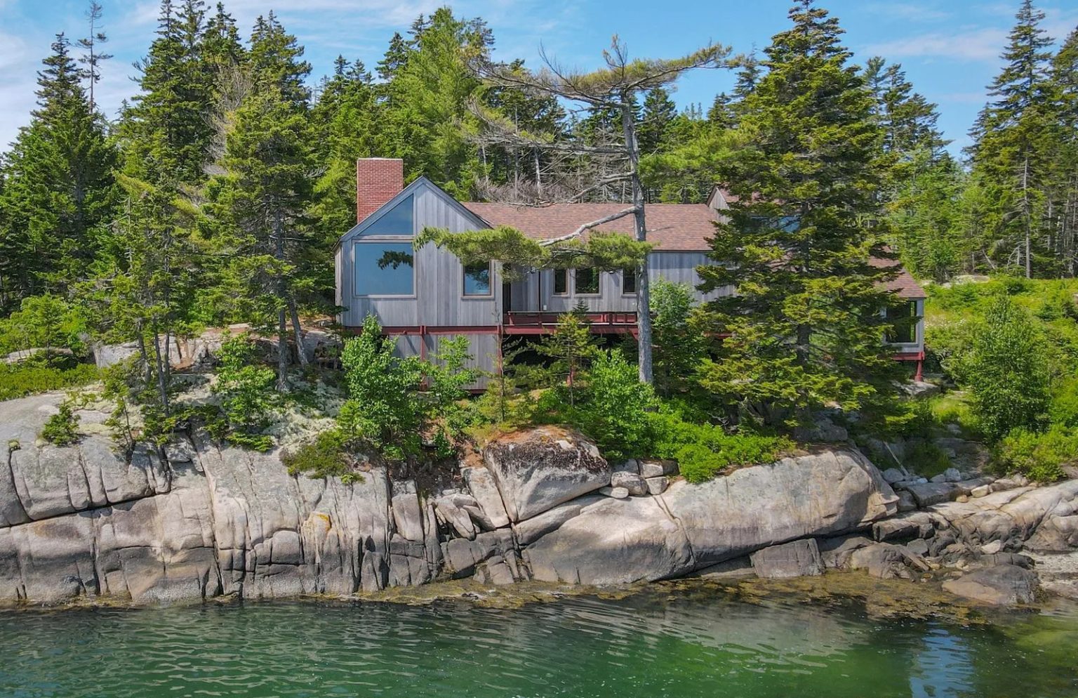 This allseason oceanfront home began life as a midcentury cabin