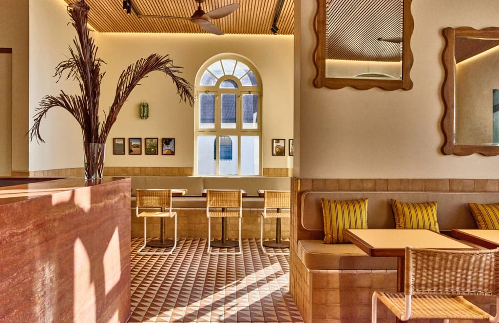 The golden light of Bondi Beach floods seaside cafe Glory Days