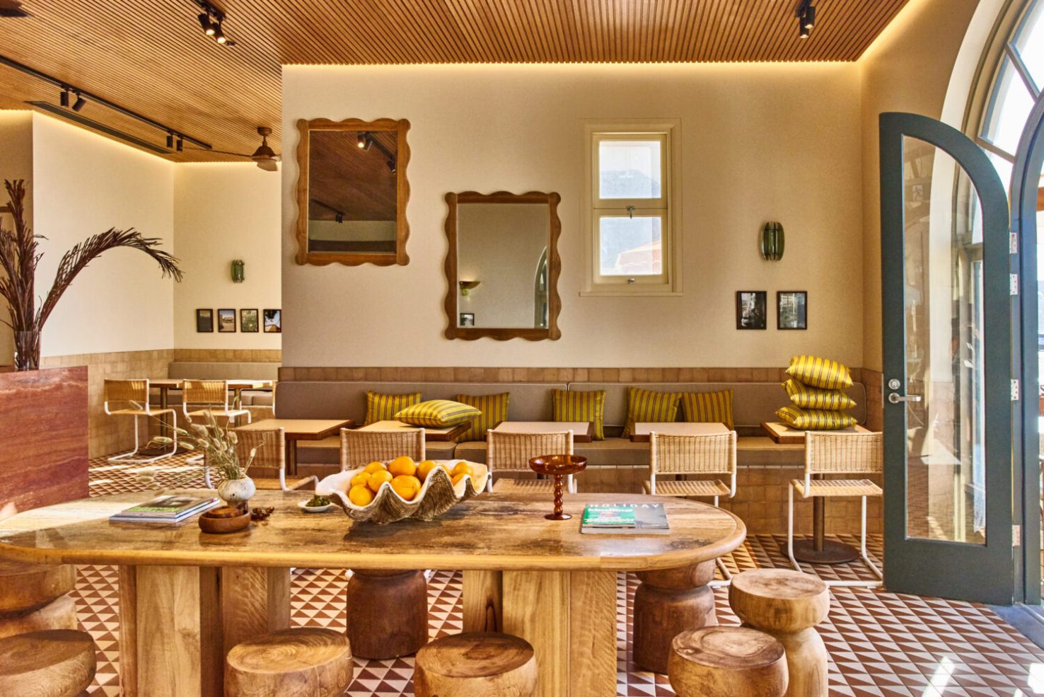 The golden light of Bondi Beach floods seaside cafe Glory Days