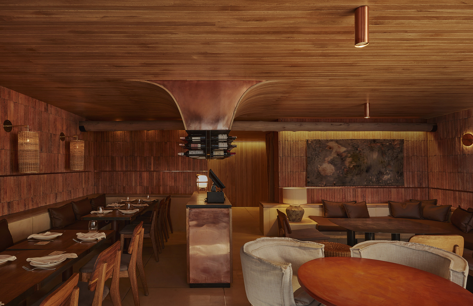 Bogotá restaurant IDEAL leans into a palette of earthy colours and textures