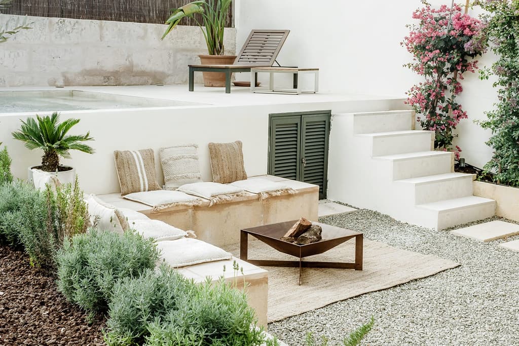 An outdoor seating area in the garden