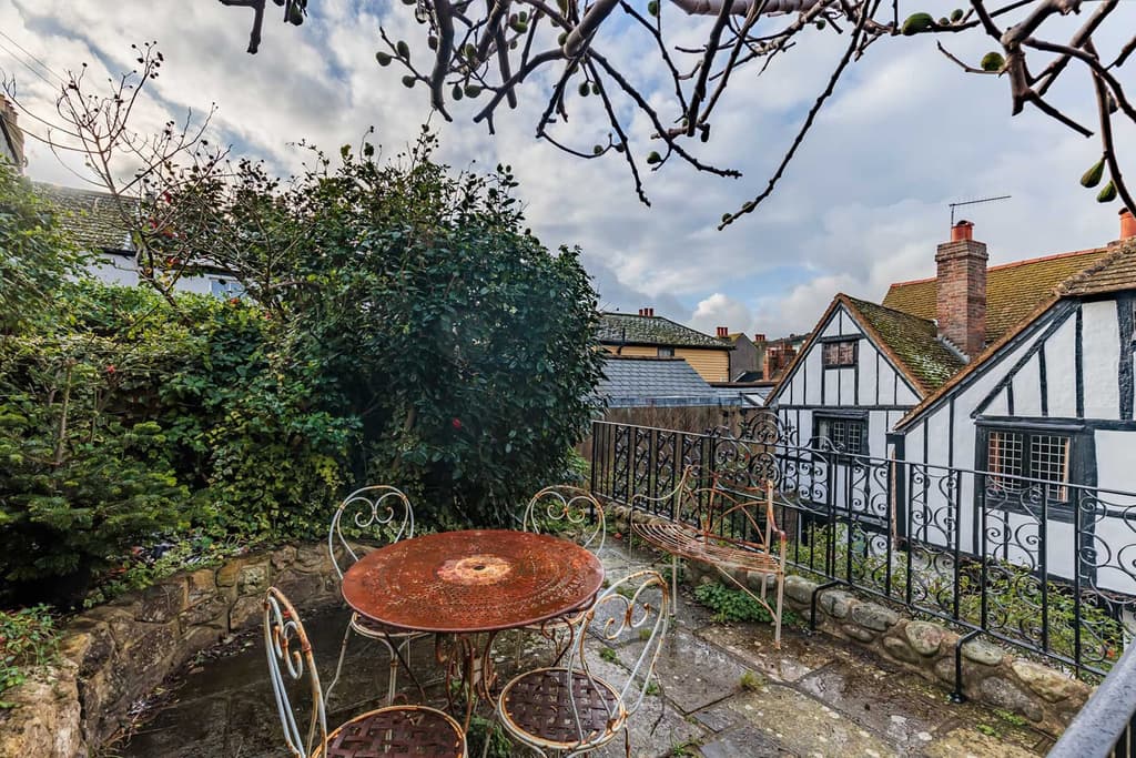 A view of the property and its garden terraces