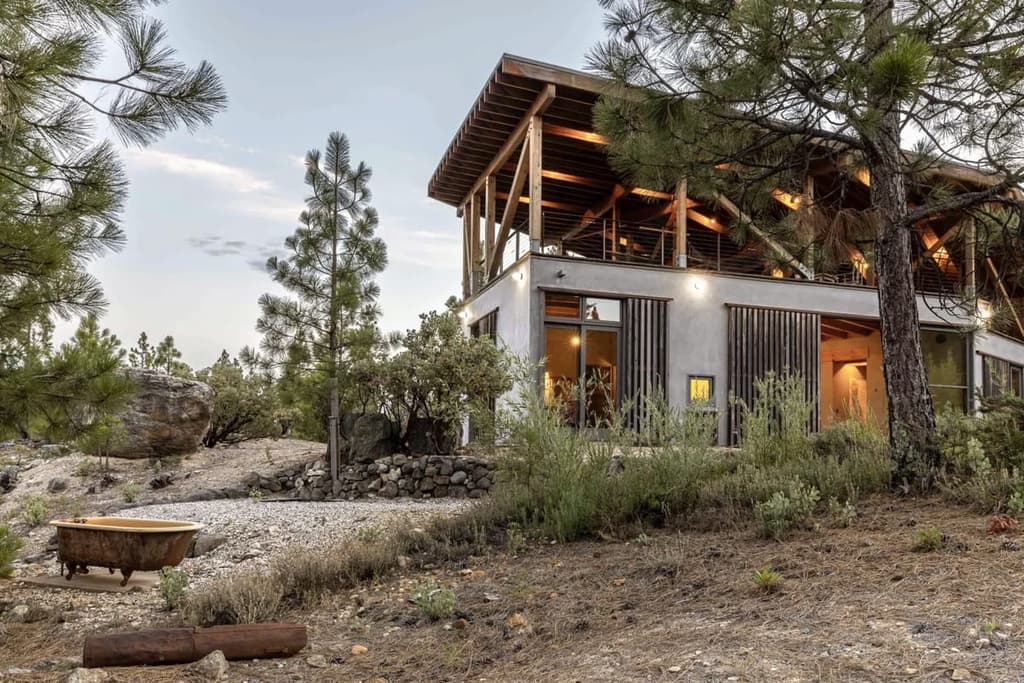 Exterior of The Mountain House, which has a single level design crowned by a vast rooftop terrace