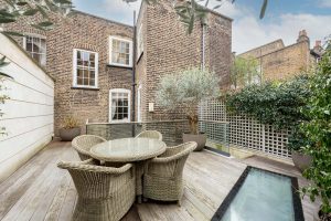 The outside deck area with glass floor cutaway.