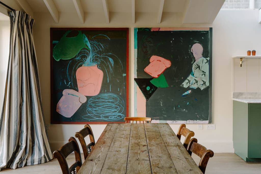 Paintings hanging in the dining room