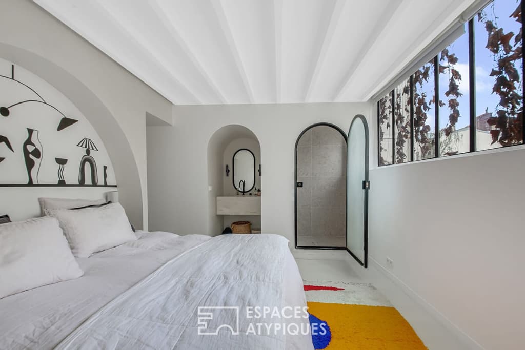One of thre three bedrooms with an ensuite