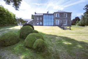 A double-height glass extension has been added to the rear of the Georgian manor house