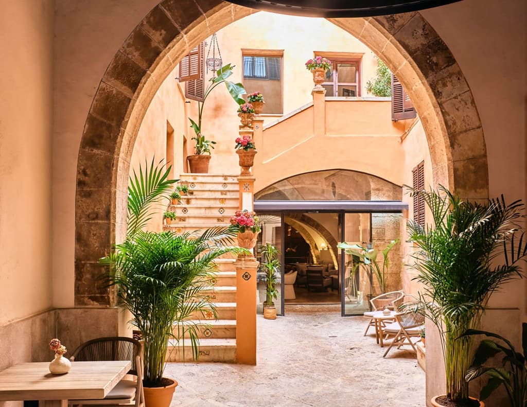 Hotel courtyard with gothic stone arches
