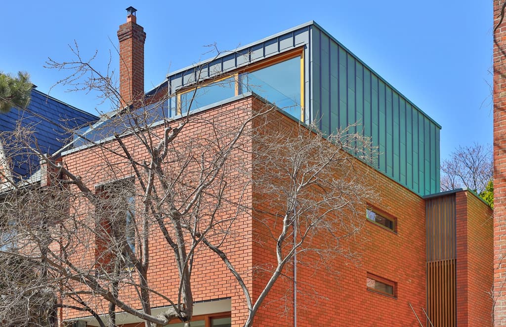 This striking brick townhouse in Toronto’s Trinity Bellwoods is a modern icon
