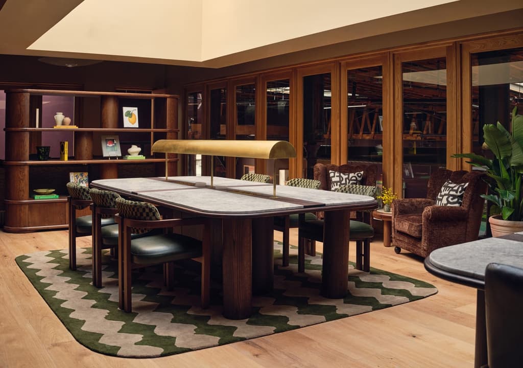A bank of desks inside the members' club