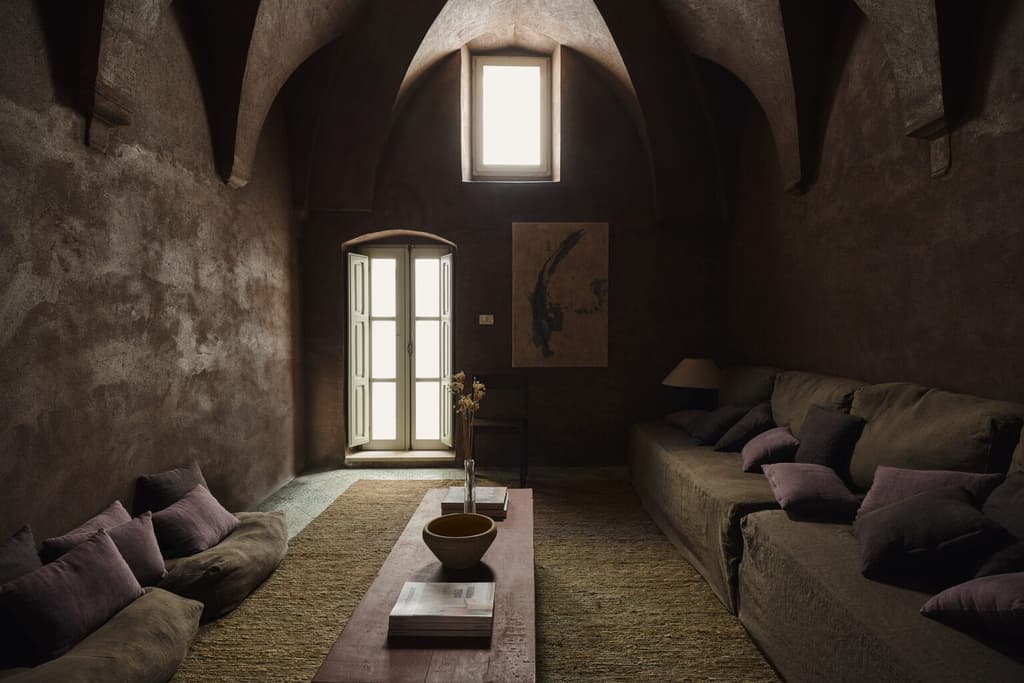 The 400-year-old chapel is now a media room with custom sofa