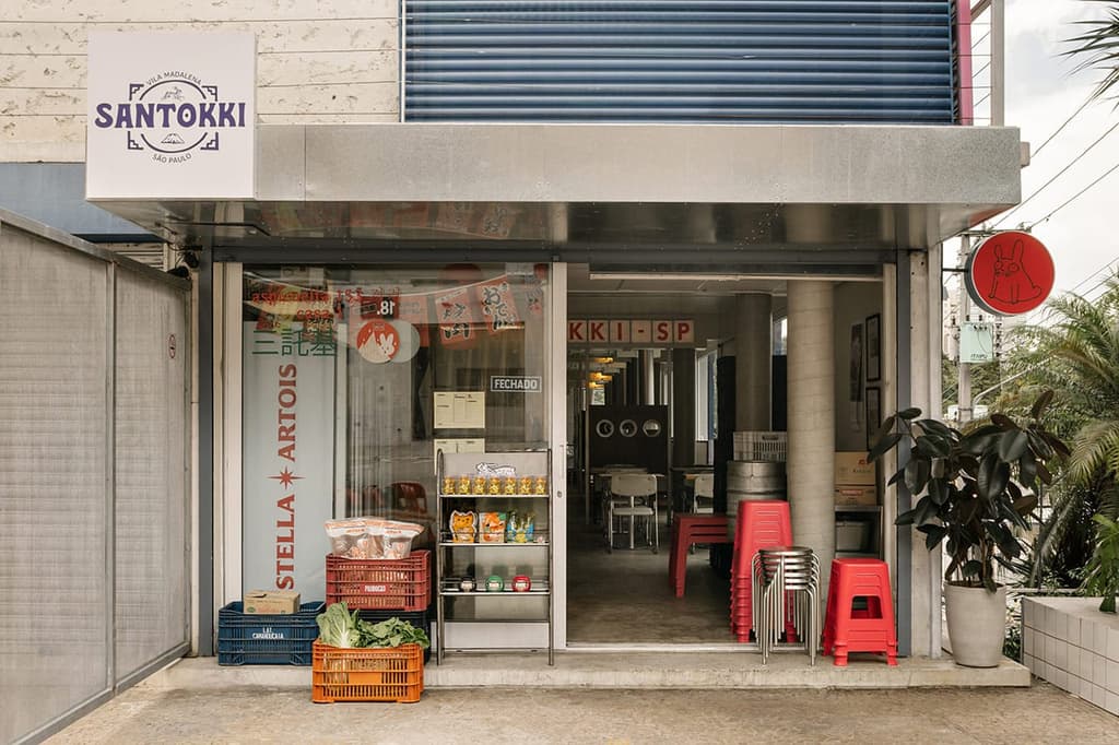 The front of the restaurant is presented like a Pan-Asian convenience store, with steel and glass refridgerators and shelving
