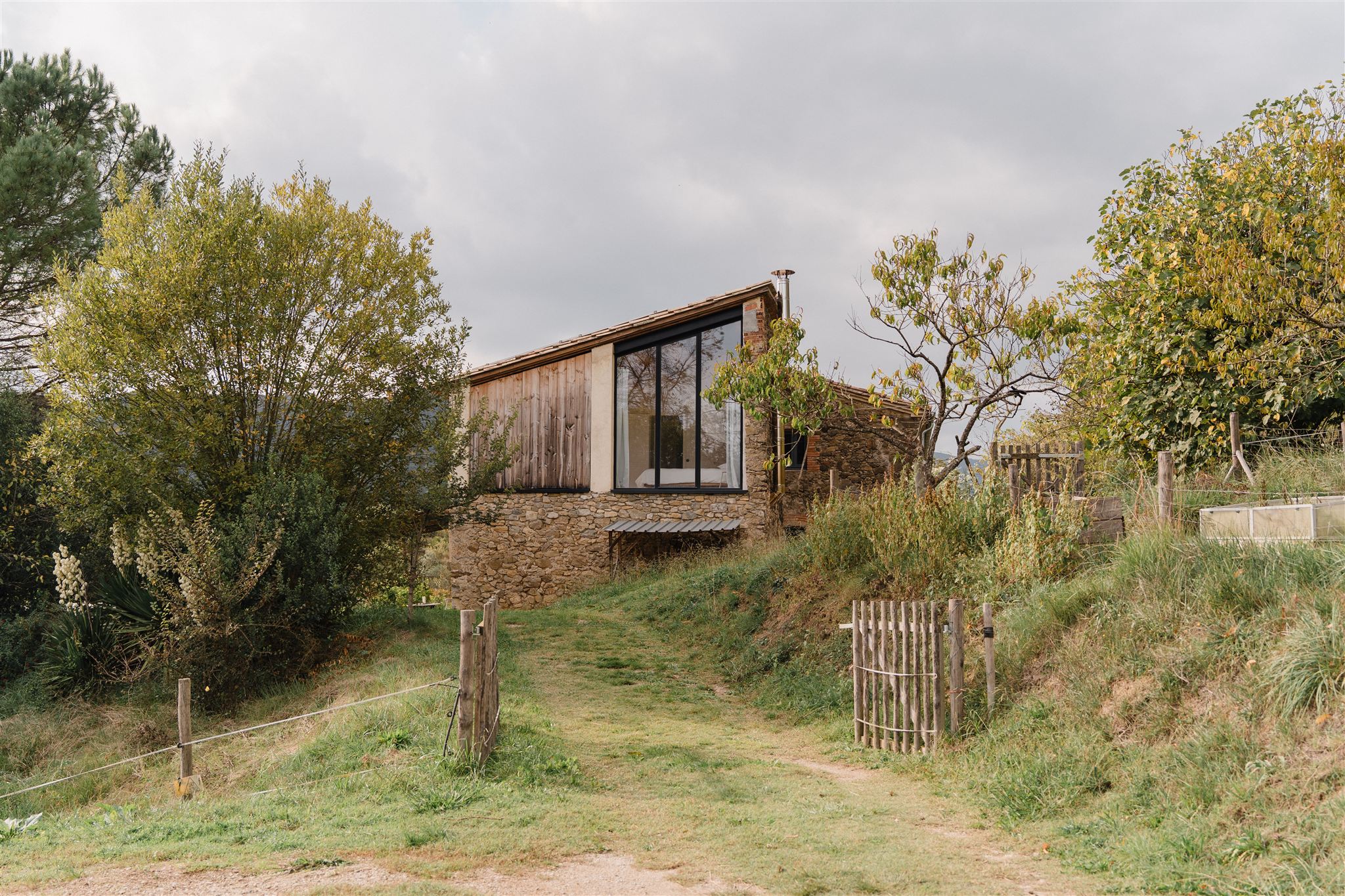 A restored farmhouse captures the stillness of rural Catalonia
