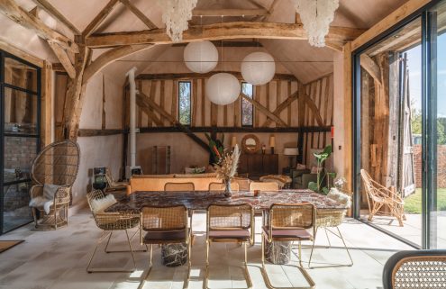 North of London, a Grade II-listed barn is reshaped through adaptive reuse
